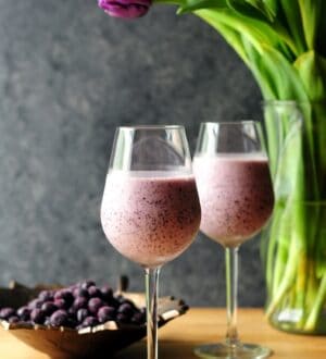 two berry shake on drinking glasses